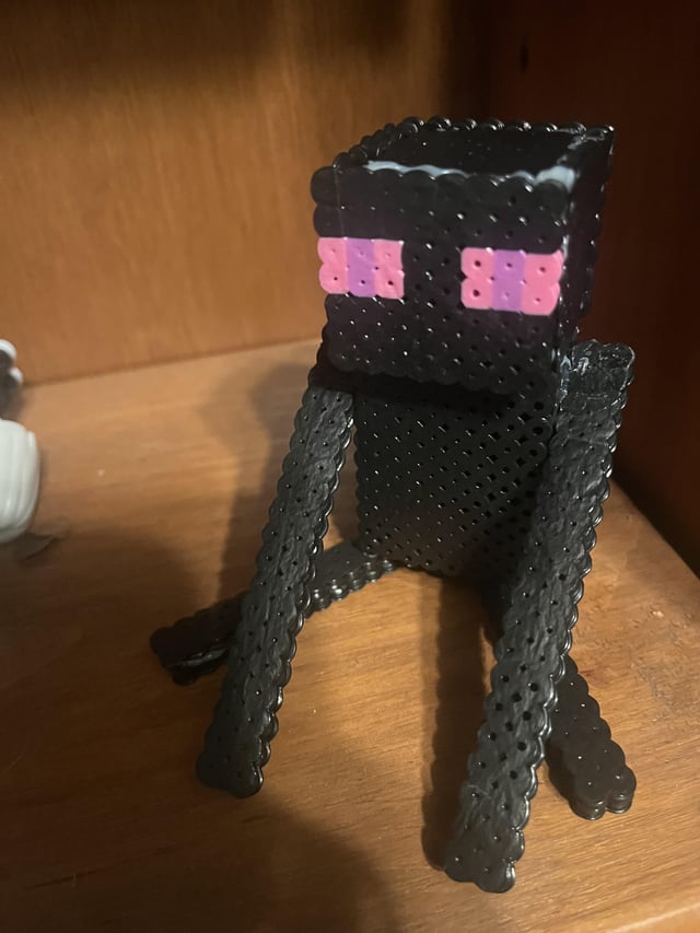 I made an enderman with perler beads and hot glue :>