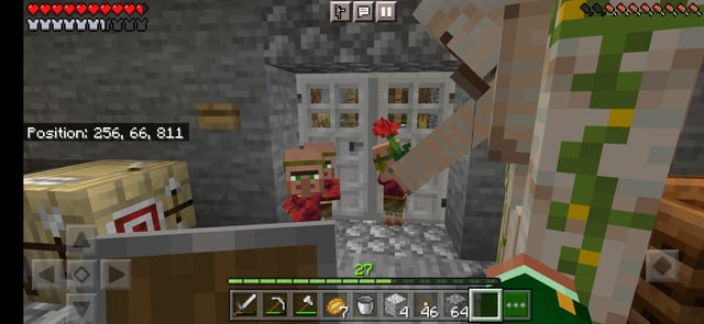 Iron golem gives flower to baby villager