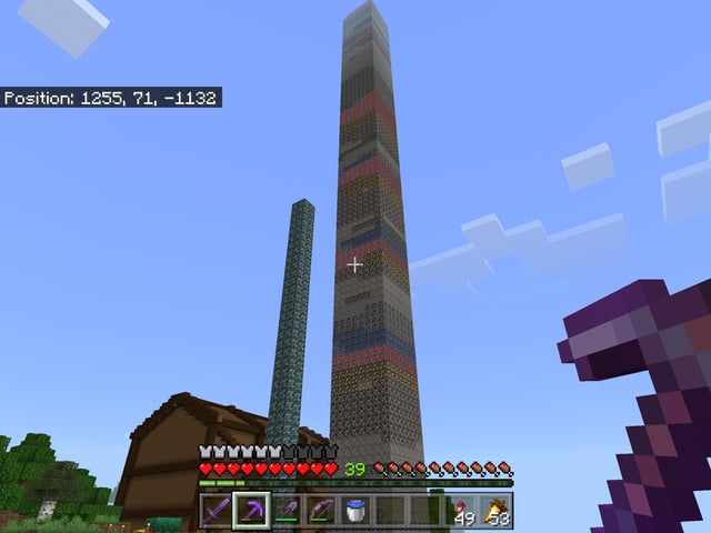 I did a little bit of mining, that is 107 blocks tall each layer is 64 blocks!