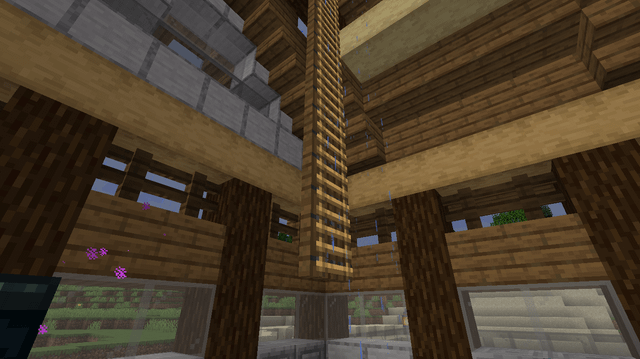 I was building a beach home in my world, when I discovered that you can place ladders onto the side of open trapdoors! I think spruce makes a nice-looking hanging ladder