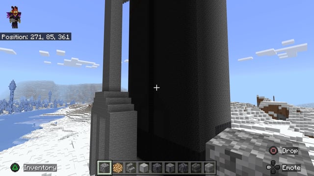 I’m in the process of building a giant statue, but i’ve come into the problem of this massive shadow, how do I light it up without putting torches on top of it?