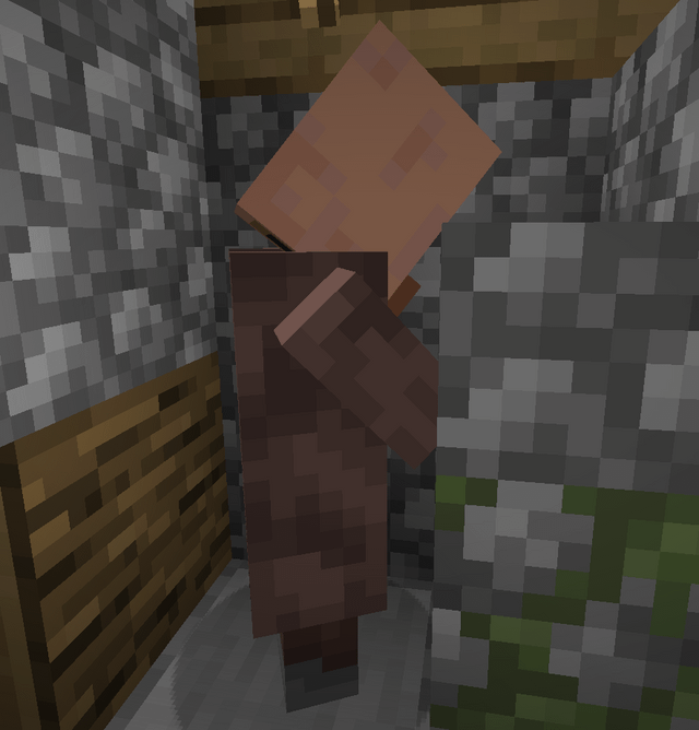 I found this villager who's just looking at the ground in a corner and never moving! I saw this happen twice by now and I'm starting to question whether it's a bug or a secret Depressed Villager! Any thoughts?