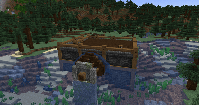 I've built this foundation and water wheel but i'm still unsure about how to do the main building