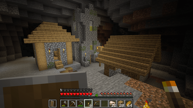 I randomly just found a part of a village in a cave...